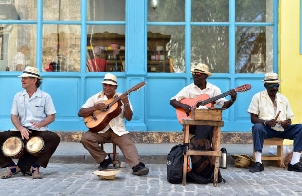 Male Cuban street musicians playing Cuban music the streets of Old Havana, Cuba