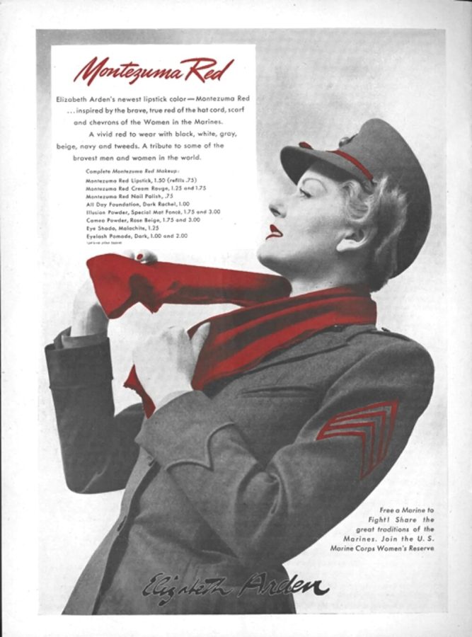An advertisement for the Montezuma Red lipstick captioned Elizabeth Ardens newest lipstick color- Montezuma Red... inspired by te brave, true red of the hat cord, scarf and chevrons of the Women in the Marines. A vivid red to wear with black, white, gray, beige, navy and tweeds. A tribute to some of the bravest men and women in the world.